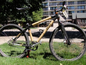 Boo 29er custom: belt-driven fully-rigid singlespeed bamboo-carbon hybrid bike with tubulars and road pedals!  Talk about unique...